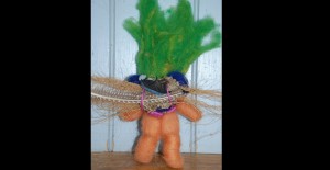 vintage-style troll felted armature with reused toysBack