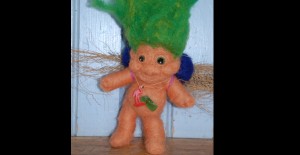 vintage-style troll felted armature with reused toysFront
